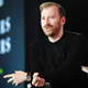 Guram Gvasalia on stage at the WWD Apparel and Retail CEO Summit